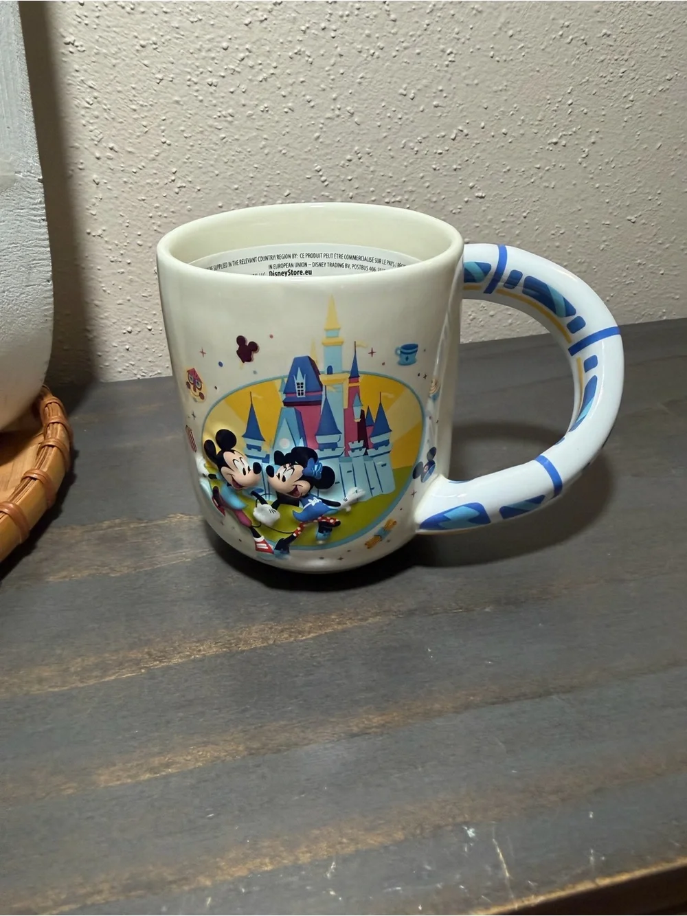 Disney mug w Mickey and Minnie featuring a monorail handle NWT